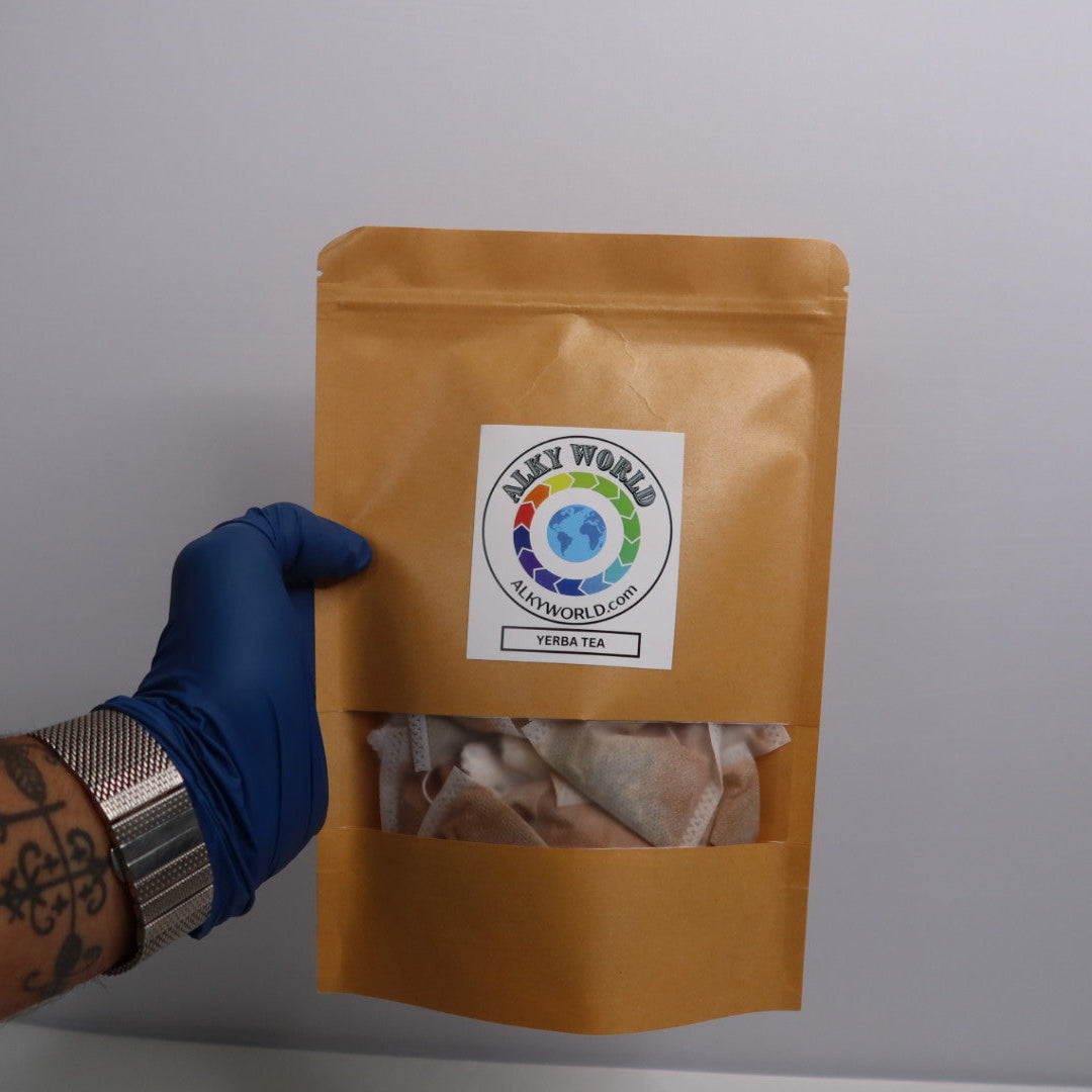 Hand wearing a blue glove holding a brown package with a label on a white background