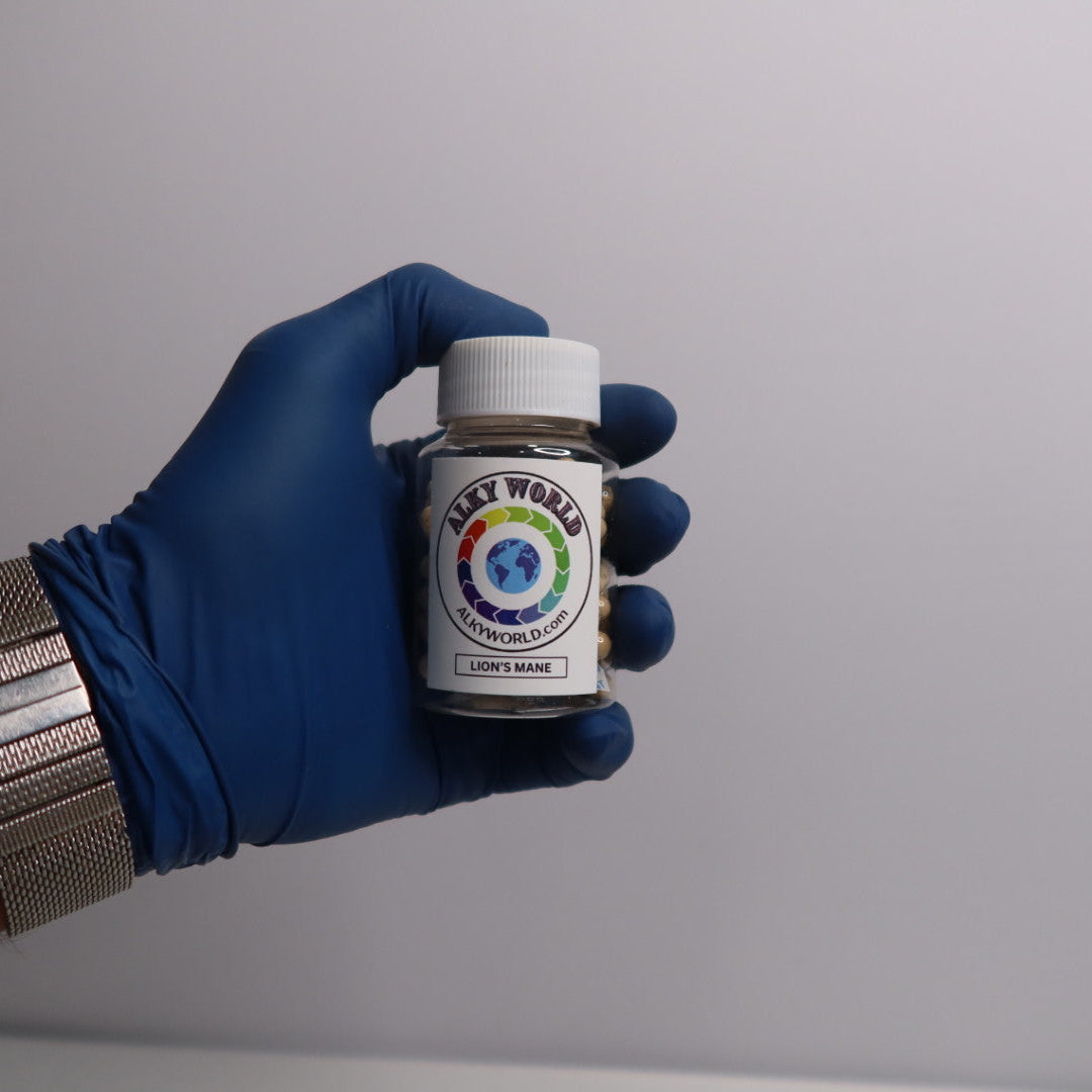 Hand wearing a blue glove holding a small jar of lions mane
